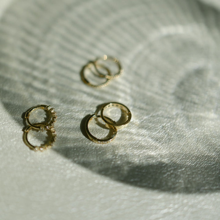 10k Solid Gold Channel CZ Huggie - Earrings -  -  - Azil Boutique